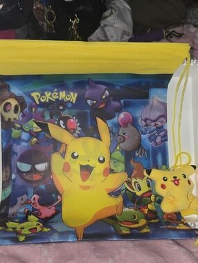 NEW...Pokémon Pikachu Yellow Drawstring Bag With Bag Charm